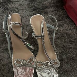 Fashion Nova Silver Heels with Sleek Design